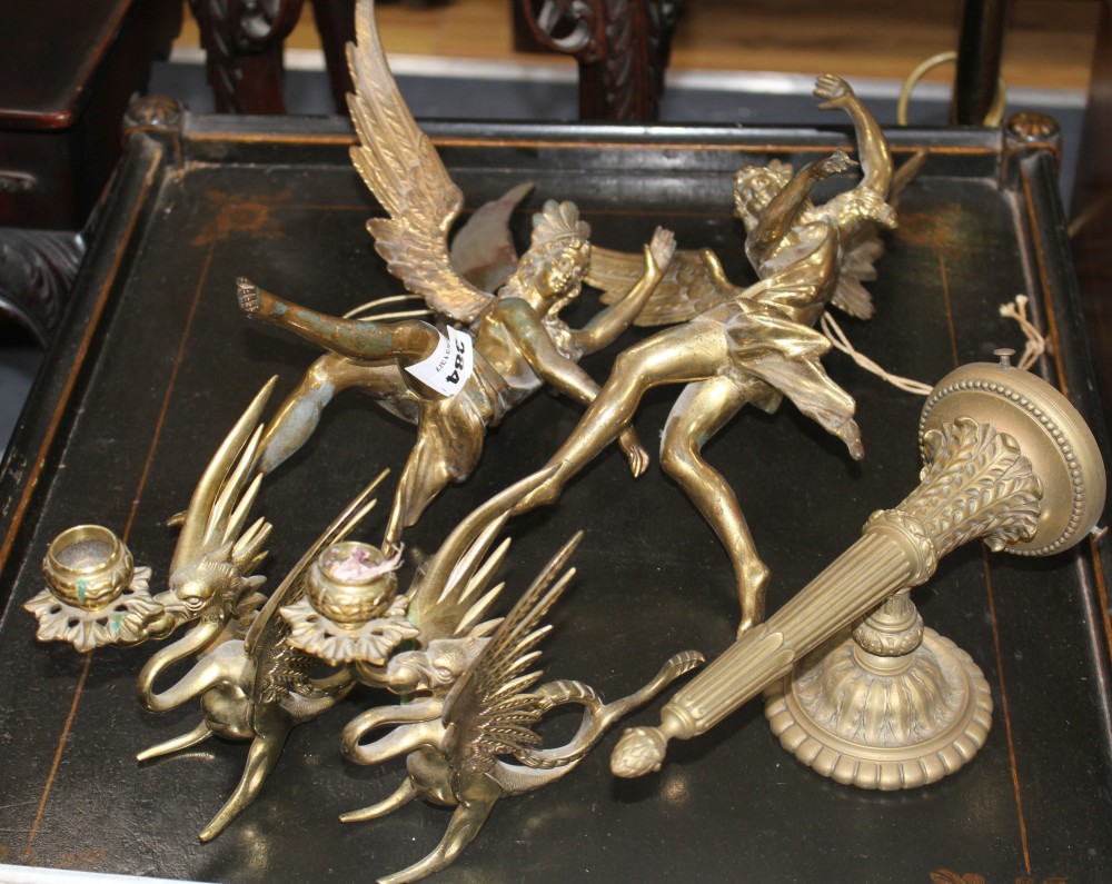 A pair of gilt bronze angel hanging light fittings, height 39cm, a torch wall light, 26cm and a pair of brass dragon chambersticks, 16c